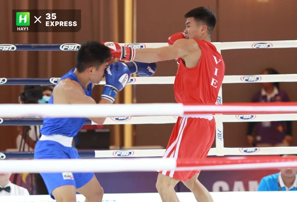 Nguyễn Văn Đương (giáp đỏ) phải chạm trán nhà đương kim vô địch SEA Games Ian Clark Bautista