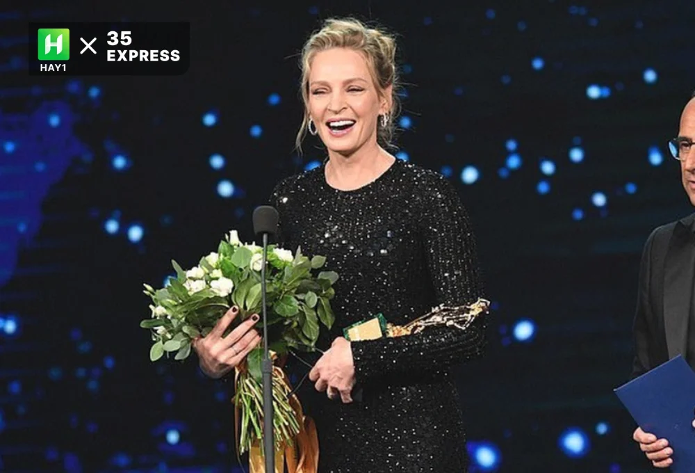 Uma Thurman trẻ trung và thanh lịch trong bộ váy dài tôn lên chiều cao 1,8m của cô